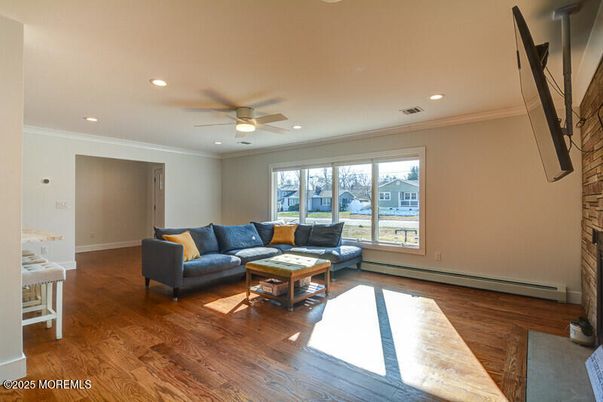 Fireplace, Interior, Living room, Recessed Lighting, Wood Texture Flooring