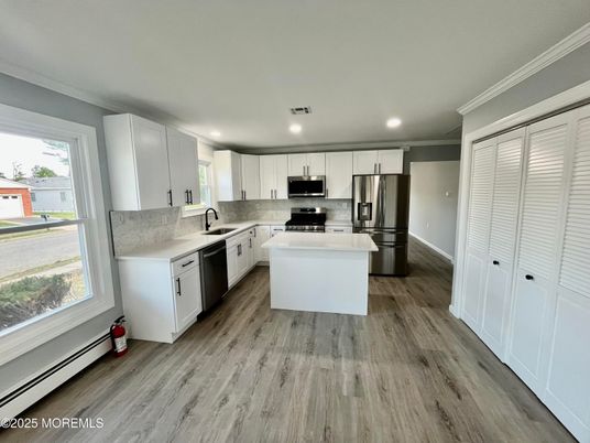 Interior, Kitchen, Recessed Lighting, Stainless Steel Appliances, Wood Texture Flooring