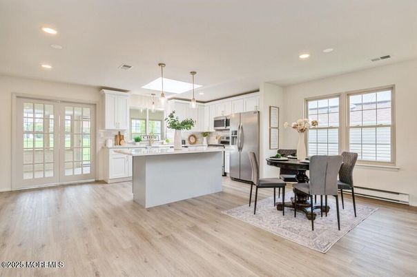 Dining room, Interior, Kitchen, Pendant Lights, Recessed Lighting, Stainless Steel Appliances, Wood Texture Flooring