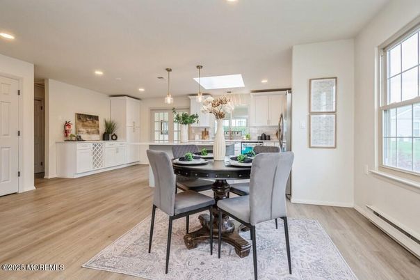 Dining room, Interior, Kitchen, Pendant Lights, Recessed Lighting, Stainless Steel Appliances, Wood Texture Flooring