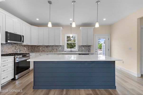 Interior, Kitchen, Pendant Lights, Recessed Lighting, Stainless Steel Appliances, Wood Texture Flooring