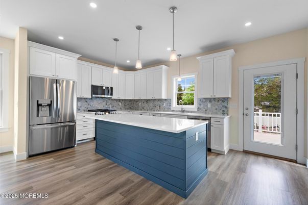 Interior, Kitchen, Pendant Lights, Recessed Lighting, Stainless Steel Appliances, Wood Texture Flooring