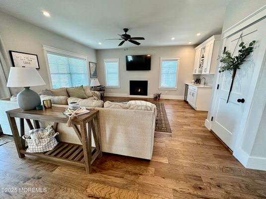 Fireplace, Interior, Living room, Recessed Lighting, Wood Texture Flooring