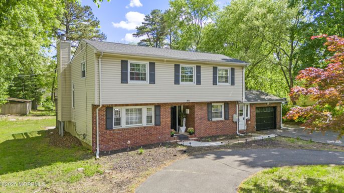 Attached, Exterior, Facade, Brick Facade, Raised Ranch