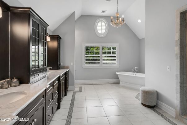 Bathroom, Chandelier, Dual Sink Vanities, Free Standing Baths, Interior, Marble, Recessed Lighting