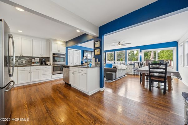 Dining room, Interior, Kitchen, Living room, Recessed Lighting, Stainless Steel Appliances, Wood Texture Flooring