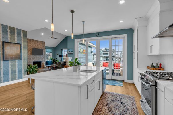 Fireplace, Interior, Kitchen, Pendant Lights, Recessed Lighting, Stainless Steel Appliances, Wood Texture Flooring