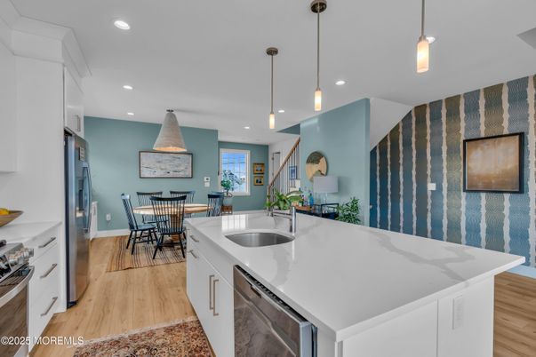 Dining room, Interior, Kitchen, Pendant Lights, Recessed Lighting, Stainless Steel Appliances, Wood Texture Flooring