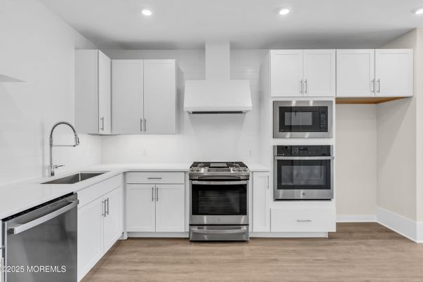 Interior, Kitchen, Recessed Lighting, Stainless Steel Appliances, Wood Texture Flooring