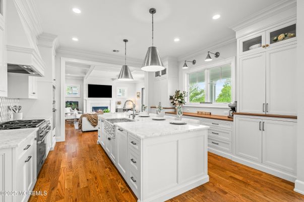 Fireplace, Interior, Kitchen, Living room, Pendant Lights, Recessed Lighting, Stainless Steel Appliances, Wood Texture Flooring