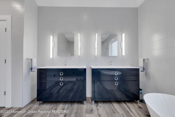 Bathroom, Dual Sink Vanities, Free Standing Baths, Interior, Wood Texture Flooring