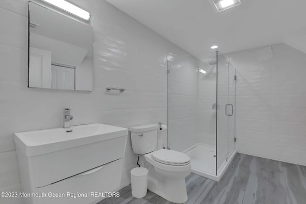 Bathroom, Glass Shower, Interior, Recessed Lighting, Wood Texture Flooring