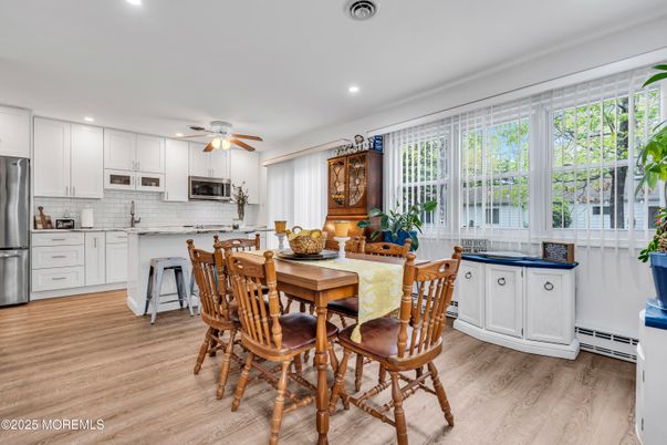 Dining room, Interior, Kitchen, Recessed Lighting, Stainless Steel Appliances, Wood Texture Flooring