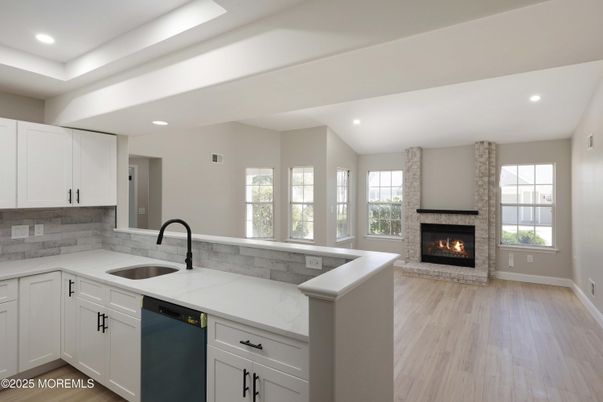 Fireplace, Interior, Kitchen, Recessed Lighting, Wood Texture Flooring