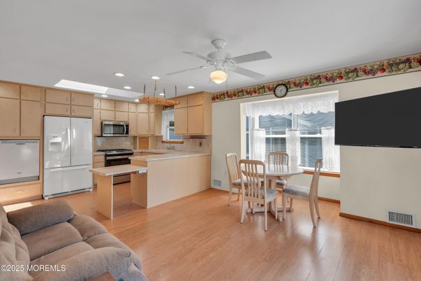 Dining room, Interior, Kitchen, Recessed Lighting, Stainless Steel Appliances, Wood Texture Flooring