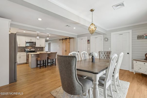 Dining room, Interior, Kitchen, Pendant Lights, Recessed Lighting, Stainless Steel Appliances, Wood Texture Flooring