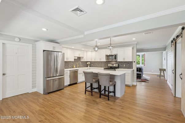Interior, Kitchen, Pendant Lights, Recessed Lighting, Stainless Steel Appliances, Wood Texture Flooring