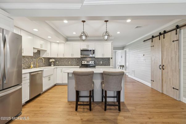 Interior, Kitchen, Pendant Lights, Recessed Lighting, Stainless Steel Appliances, Wood Texture Flooring