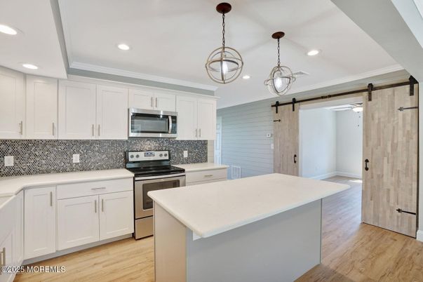 Interior, Kitchen, Pendant Lights, Recessed Lighting, Stainless Steel Appliances, Wood Texture Flooring