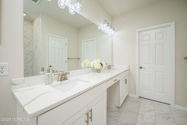 Bathroom, Dual Sink Vanities, Interior, Marble, Marble Walls, Recessed Lighting