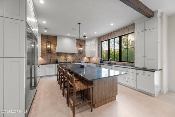 Interior, Kitchen, Pendant Lights, Recessed Lighting, Stainless Steel Appliances, Stone Walls, Wooden Beams