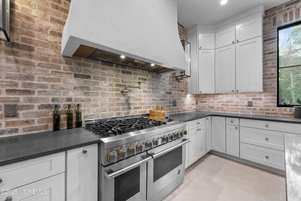 Interior, Kitchen, Recessed Lighting, Stainless Steel Appliances, Stone Walls