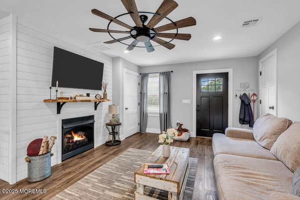 Fireplace, Interior, Living room, Recessed Lighting, Wood Texture Flooring