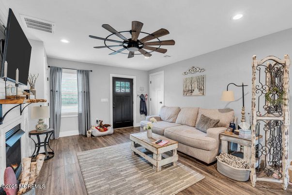 Fireplace, Interior, Living room, Recessed Lighting, Wood Texture Flooring