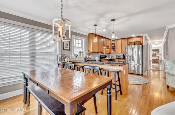 Dining room, Interior, Kitchen, Pendant Lights, Stainless Steel Appliances, Wood Texture Flooring