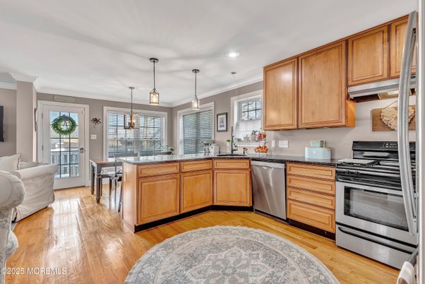 Dining room, Interior, Kitchen, Pendant Lights, Recessed Lighting, Stainless Steel Appliances, Wood Texture Flooring