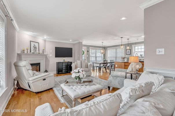 Dining room, Fireplace, Interior, Living room, Pendant Lights, Recessed Lighting, Wood Texture Flooring