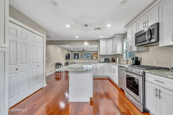 Interior, Kitchen, Pendant Lights, Recessed Lighting, Stainless Steel Appliances, Wood Texture Flooring