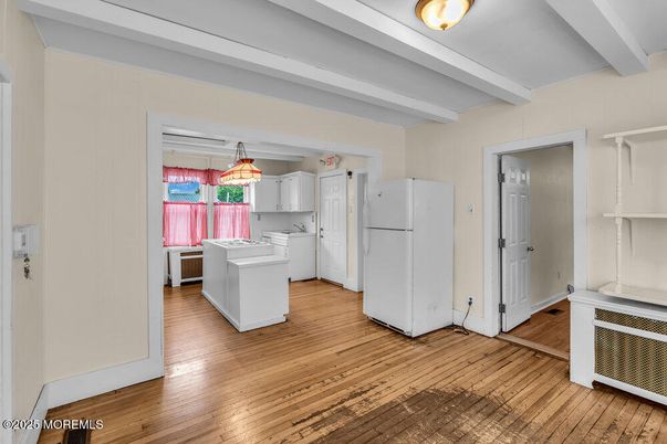 Interior, Kitchen, Pendant Lights, Washer, Wood Texture Flooring
