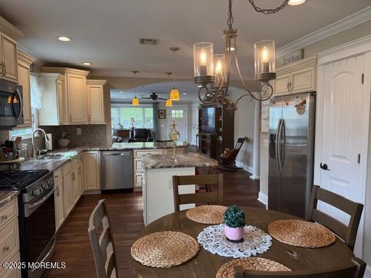 Dining room, Interior, Kitchen, Pendant Lights, Recessed Lighting, Stainless Steel Appliances, Wood Texture Flooring