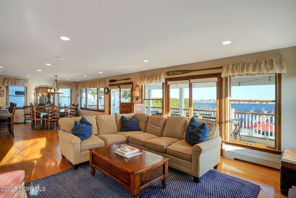 Dining room, Interior, Living room, Pendant Lights, Recessed Lighting, Water, Wood Texture Flooring