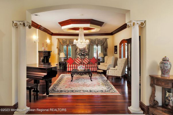 Chandelier, Interior, Living room, Piano, Recessed Lighting, Wood Texture Flooring