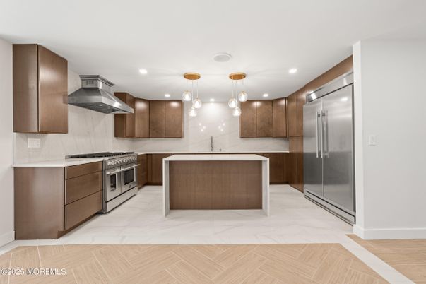 Interior, Kitchen, Marble, Pendant Lights, Recessed Lighting, Stainless Steel Appliances, Wood Texture Flooring