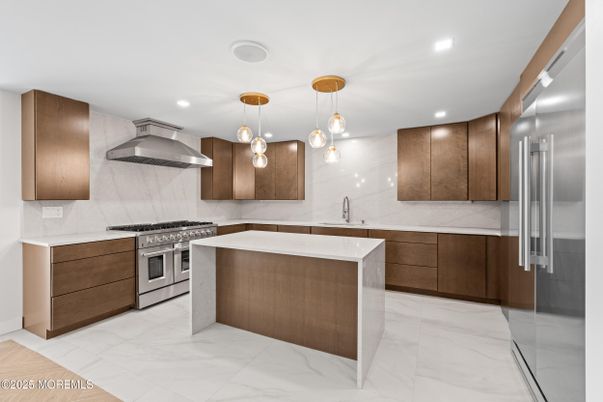 Interior, Kitchen, Marble, Marble Walls, Pendant Lights, Recessed Lighting, Stainless Steel Appliances