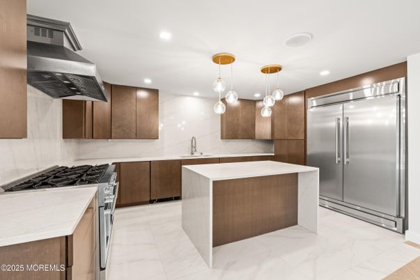 Interior, Kitchen, Marble, Marble Walls, Pendant Lights, Recessed Lighting, Stainless Steel Appliances
