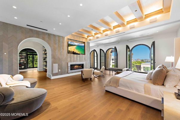 Bedroom, Fireplace, Interior, Recessed Lighting, Wood Texture Flooring