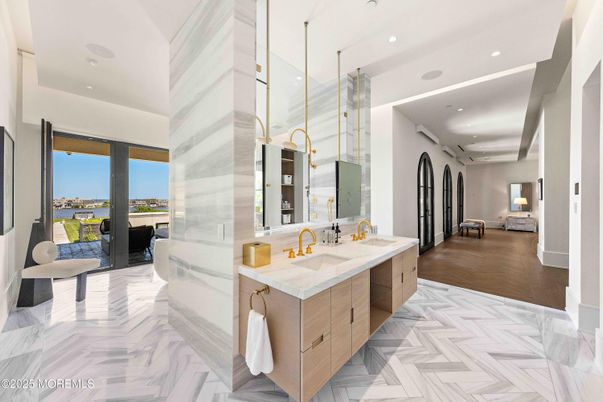 Bathroom, Dual Sink Vanities, Interior, Marble, Recessed Lighting, Water, Wood Texture Flooring