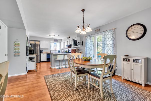 Dining room, Interior, Kitchen, Pendant Lights, Stainless Steel Appliances, Wood Texture Flooring
