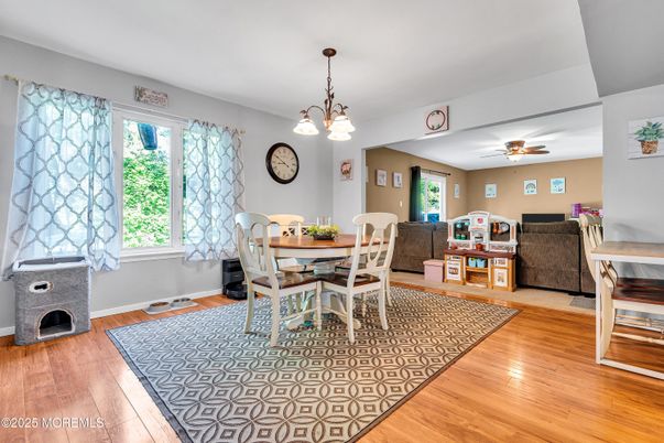 Dining room, Fireplace, Interior, Pendant Lights, Wood Texture Flooring