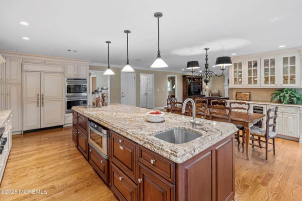 Dining room, Interior, Kitchen, Pendant Lights, Recessed Lighting, Stainless Steel Appliances, Wood Texture Flooring
