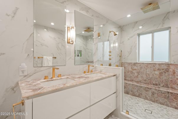 Bathroom, Dual Sink Vanities, Interior, Marble, Marble Walls, Recessed Lighting