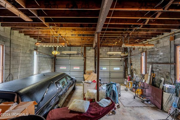 Garage, Interior, Stone Walls, Wooden Beams
