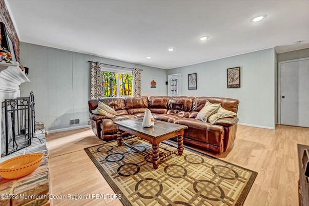 Fireplace, Interior, Living room, Recessed Lighting, Wood Texture Flooring