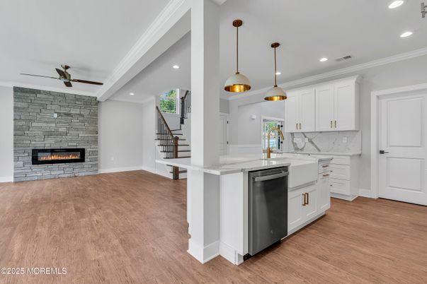Fireplace, Interior, Kitchen, Pendant Lights, Recessed Lighting, Stone Walls, Wood Texture Flooring