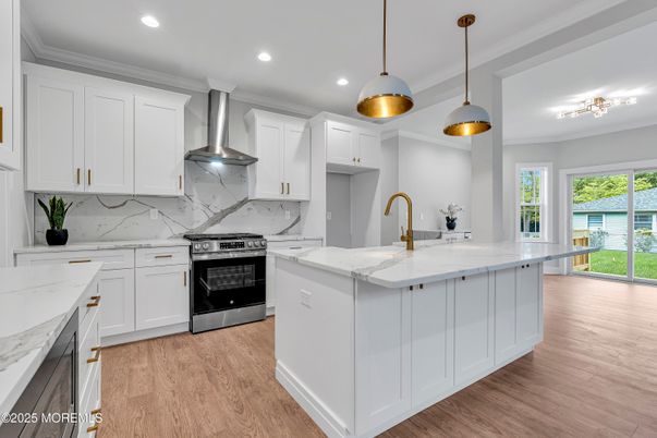 Interior, Kitchen, Marble Walls, Pendant Lights, Recessed Lighting, Stainless Steel Appliances, Wood Texture Flooring