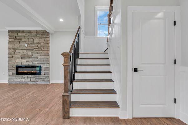 Fireplace, Interior, Recessed Lighting, Stone Walls, Wood Texture Flooring